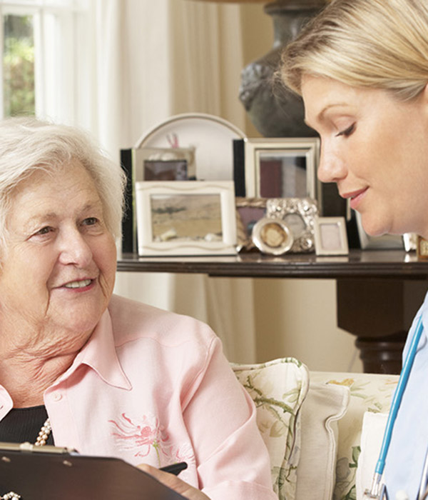 Doctor consulting with an elderly patient